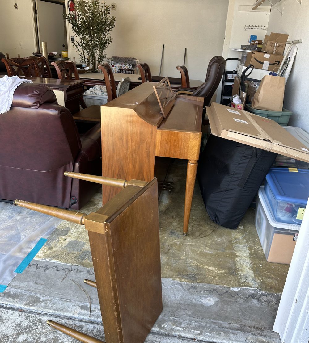 Dresser, desk and other old furniture ready for removal