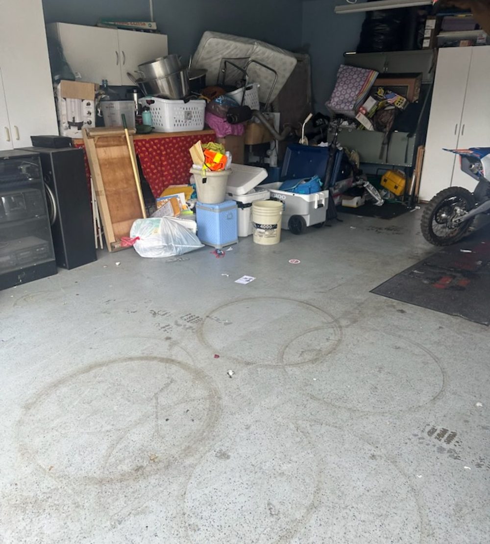 Garage with old items and boxes waiting to be removed